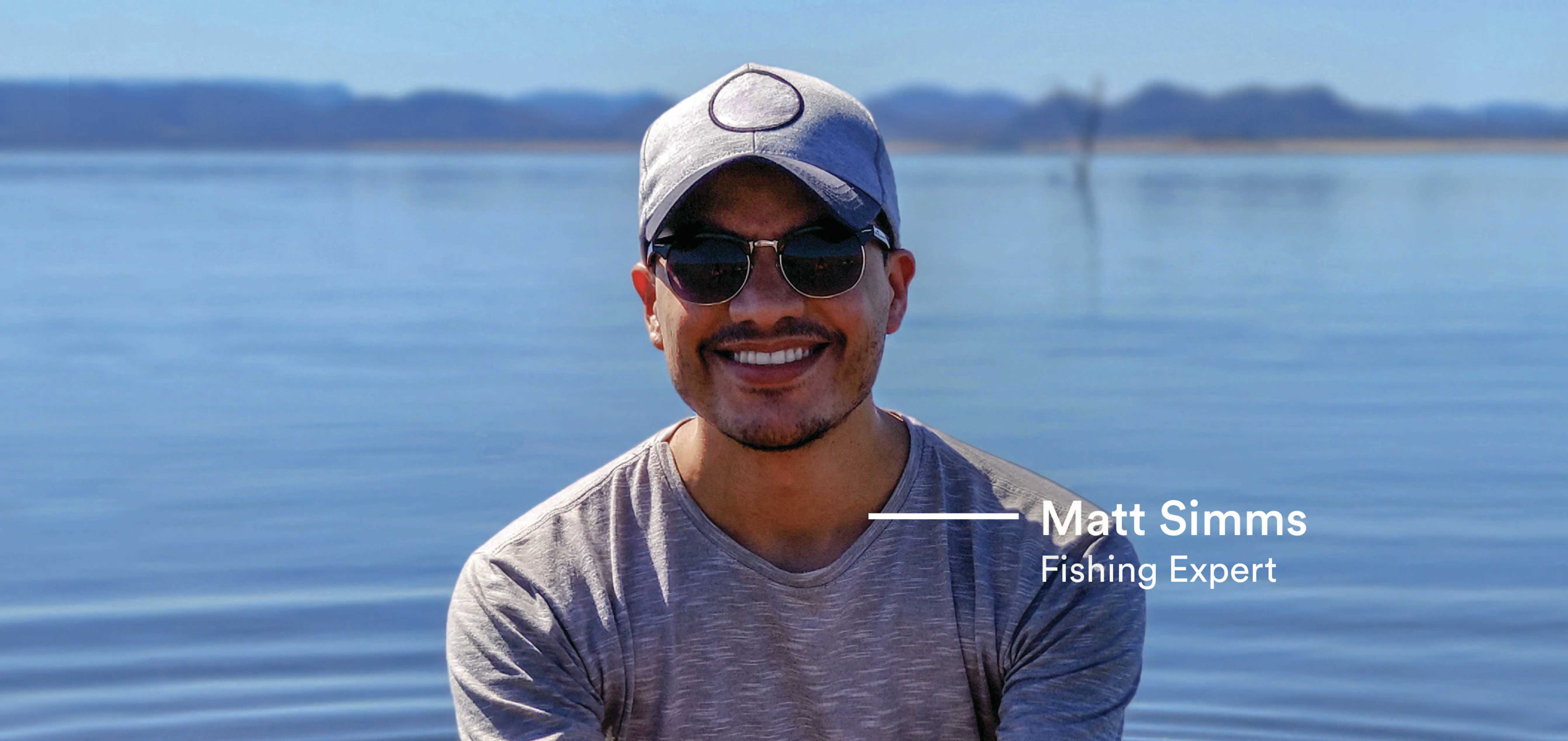 Conventional Fishing Expert Matt Simms smiles at a lake. 